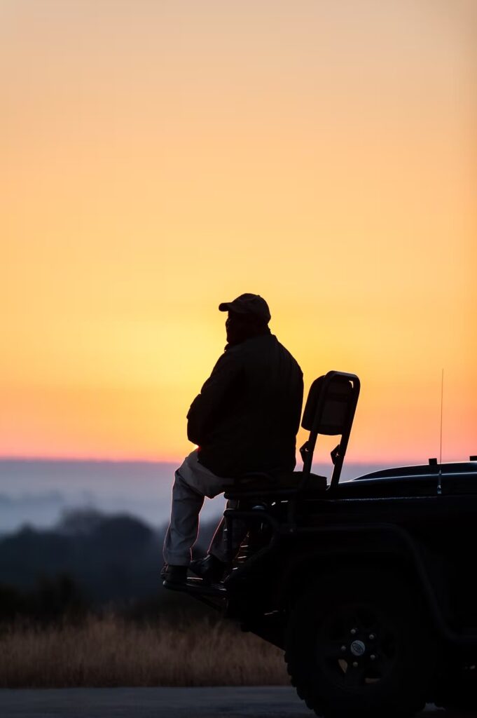 Sitting out on the bonnet of the vehicle as the sun comes up