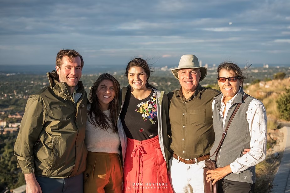 The Abramo family with their guides on a hilltop above Johannesburg