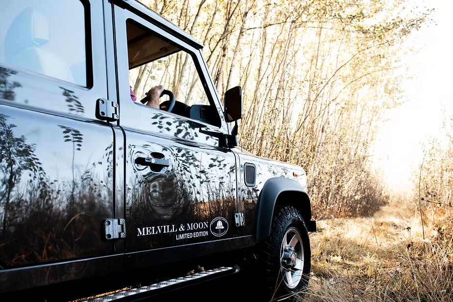 A Land Rover Defender fitted out by Melvill and Moon heading out through the bush