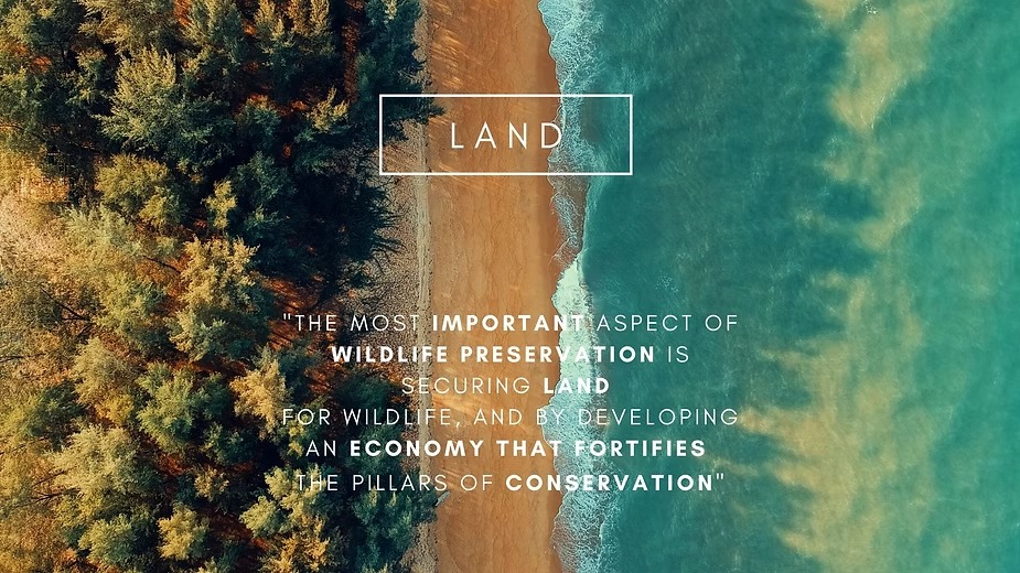 Earth Day title card reading Land, over an aerial view of a wild coastline