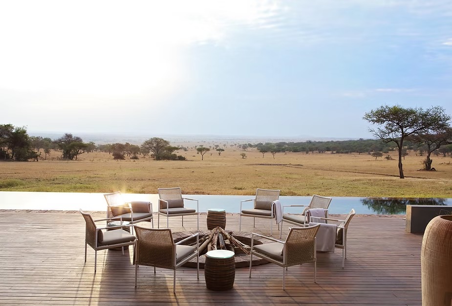 The pool deck at Singita Serengeti House looking out over the plains